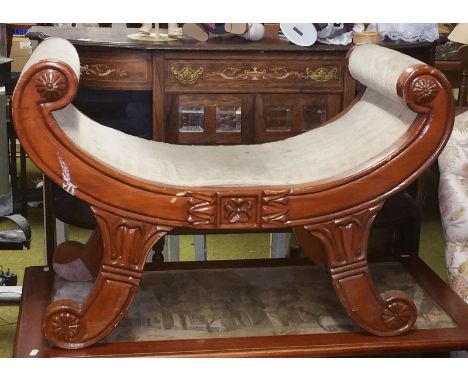 A Stained Stool with Scroll Arms.