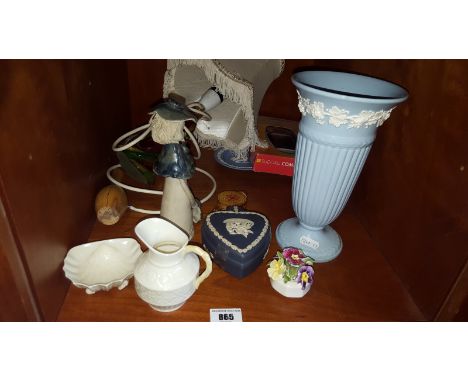 A Shelf of Items to Include a Wedgwood Trumpet Vase, pottery figure, floral posies, 