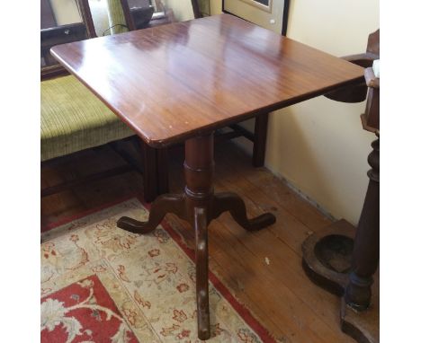 A Pair of Mahogany Occasional Tables, having square tops on turned supports and tripod bases, the top approx. 27 x 27ins.