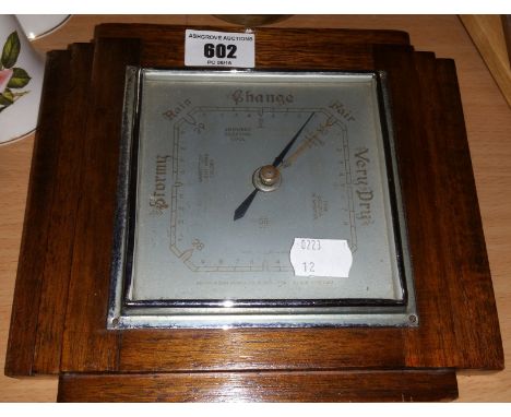 An Early 20th Century Oak Cased Barometer.