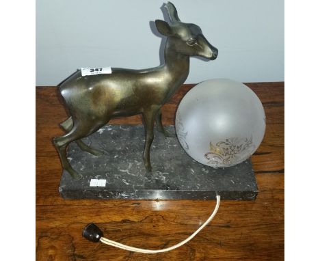 An Art Deco Design Figural Table Lamp formed as a Bronzed Metal Deer;  standing on a marbled slate base with globe etched gla