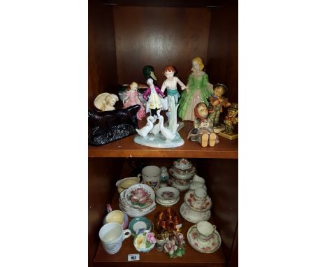 A Shelf of Various Tea Cups and Saucers; with copper napkin rings, an Early Royal Doulton Figure of Rose HN1416 signed undern