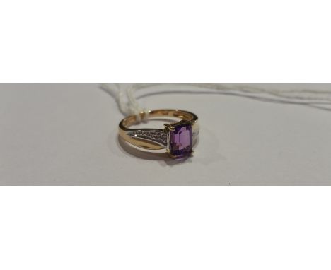 A 9ct Diamond and Amethyst Cluster Ring.