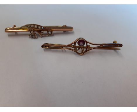 A 9ct gold bar brooch with inset seed pearls together with a yellow metal bar brooch with single seed pearl and amethyst cabo