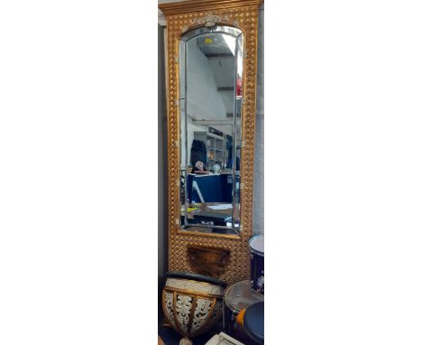 A tall Eastern inspired gold and cream painted wall mirror with incorporated demi lune shelf with integral lamp and drawerLoc