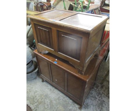 Two oak coffers to include a mid 20th century oak example with linenfold decoration 52.5cm h x 78.5cm w, together with a pine