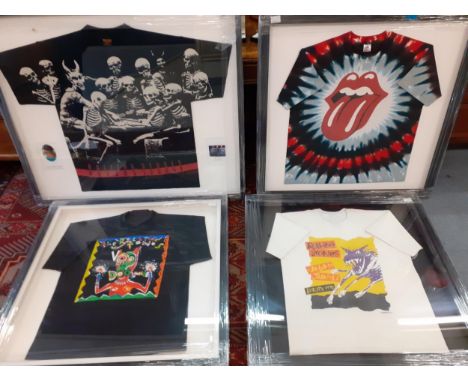 A collection of four framed Rolling Stones Vintage Tour T-shirtsLocation: RWF 