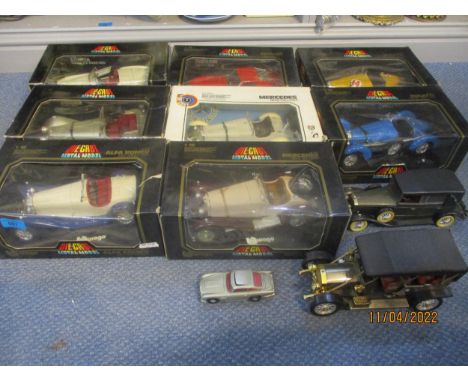 A collection of boxed Burago&nbsp;diecast model vehicles to include a vintage Mercedes Benz SSKL (1931) model, and a Corgi 00