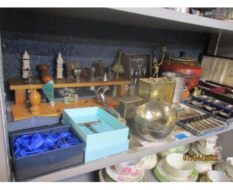 A mixed lot to include a bottle stopper collection on a wooden stand, cased, horn handled carving set, carriage clock, table 