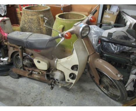 A Honda C90 motorcycle, beaver brown colour, one owner from new, first registered 14/08/1975, in need of restoration, copy of