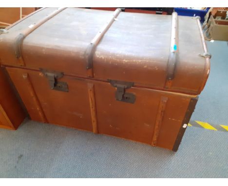 A 19th century leather bound with treen strapwork trunk, leather side handles A/F having a drop down front and three internal