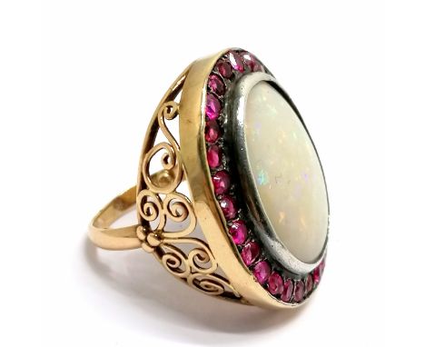 Unmarked gold large opal &amp; ruby (?) cluster ring - size M½+ &amp; 10.5g total weight ~ head of ring 2.9cm long &amp; opal