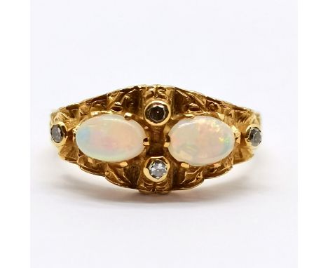 18ct marked gold opal (2) &amp; diamond (4) ring with scroll detail on shoulders - size O &amp; 4.2g total weight