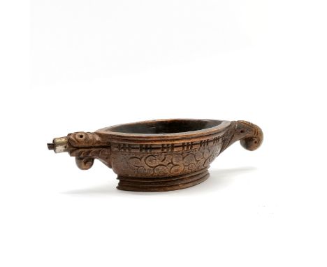 Indian hand carved wooden oil lamp with metal spout - 24cm across