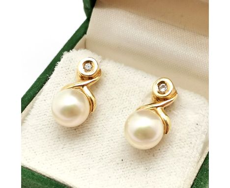 18ct marked gold good quality pearl &amp; diamond set earrings marked PM B1 - 1.4cm drop &amp; 4.5g total weight and 1 replac