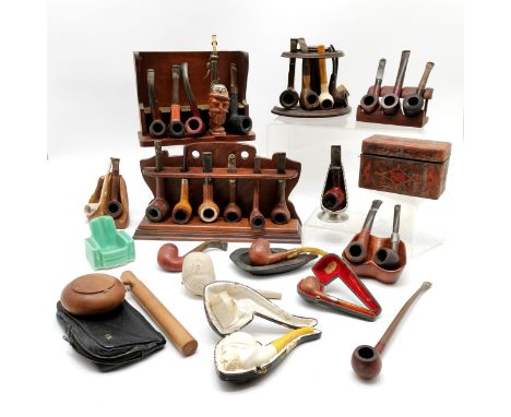 Collection of pipes / stands inc W H Newman Ltd (Chester silver) mounted, Fred K Tranter, Baronite (Holland), Meerschaum (in 