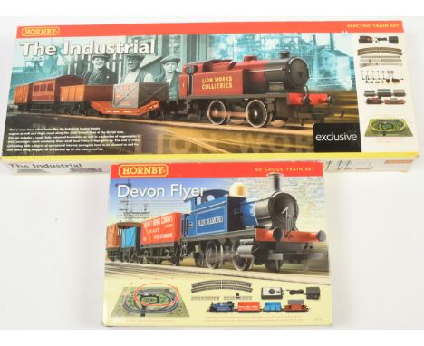 Hornby (China) pair of trains sets comprising of R.1088 "The Industrial" and R.1121 "Devon Flyer". Both sets are incomplete. 