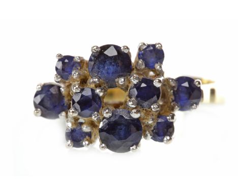 EARLY 1970S SAPPHIRE DRESS RINGset with round sapphires in various sizes, marked 18CT, size K, 4.5g