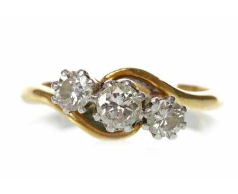 MID TWENTIETH CENTURY DIAMOND THREE STONE RINGset with three graduated round brilliant cut diamonds totalling approximately 0