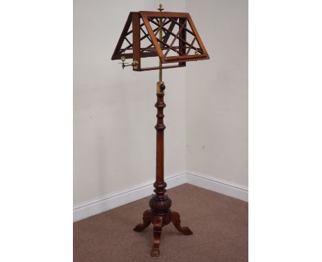 Victorian and later rosewood duet music stand, two adjustable trellis stands with brass candle sconces, raised on adjustable 