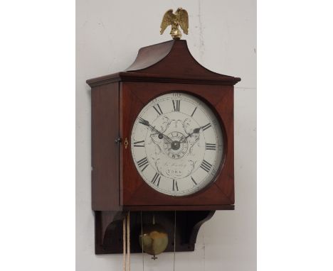 19th century mahogany wall clock, circular silvered Roman dial signed Jno Hartley York, arched case with eagle finial, single