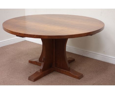 'Mouseman' oak circular adzed top dining table raised on cruciform base, by Robert Thompson of Kilburn, D144cm, H74cm Conditi