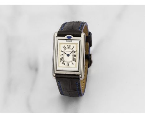 Cartier. Insolite montre bracelet de dame en acier rectangulaire reversible mouvement quartzCartier. An unusual lady's stainl