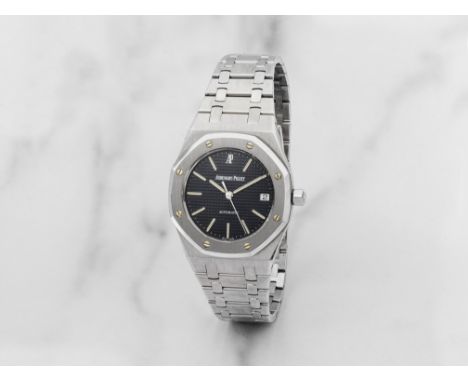 Audemars Piguet. Belle montre bracelet en acier avec date mouvement automatiqueAudemars Piguet. A fine stainless steel automa