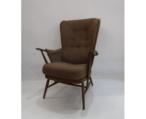 Ercol cottage style open armchair with brown upholstered back and seat 