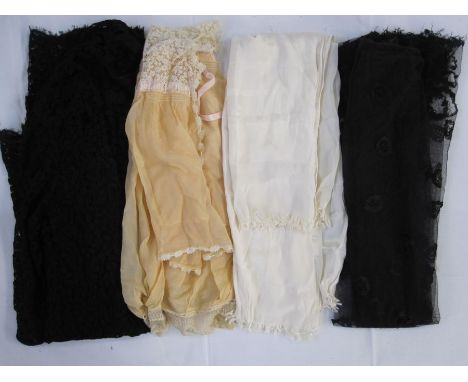 Victorian black lace length with a draw ribbon through one side, possibly a black overskirt, a Victorian black lace evening j