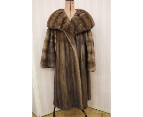 Vintage mink coat with a deep shawl collar, bell bracelet sleeves, patterned liningCondition ReportPlease see additional imag