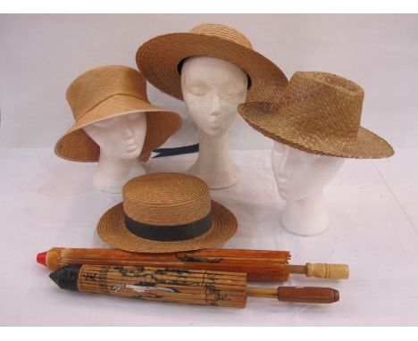 Two paper laquered parasols and a selection of  vintage and later woven hats to include Asian-style, Venetian Las Vegas Casin