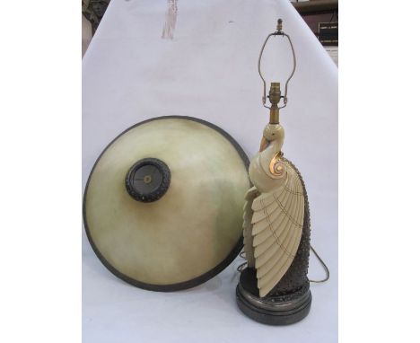 Possibly 1930's table lamp, the body in the form of a stylised peacock, carved wood in cream and gilt and large shade, approx