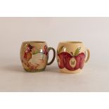 Two Moorcroft mugs to include red apples and Cockerel at sunrise (2)
