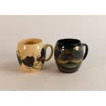 Two Moorcroft mugs to include Trail Chocolate Cosmos dated 12/1/15 together with Western Isles. Both