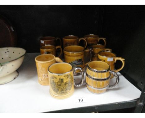 10 assorted ceramic tankards including Wade, Britannia, Lord Nelson