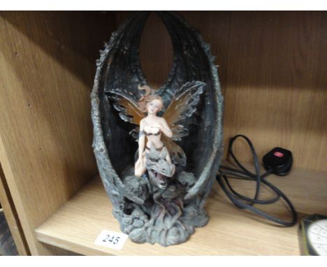 A light in the form of Lady Riding a Dragon
