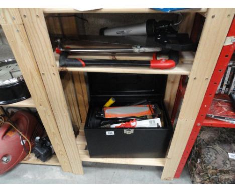 A box of tools including chisels etc and other tools