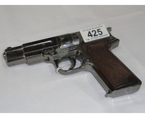 A vintage JOAL Made in Spain die-cast cap gun