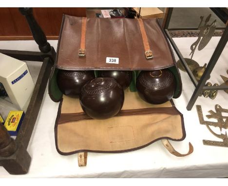 A set of 4 vintage Jaques bowls and holder