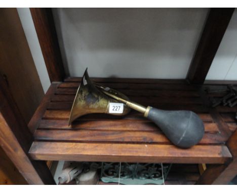 A vintage style brass car horn