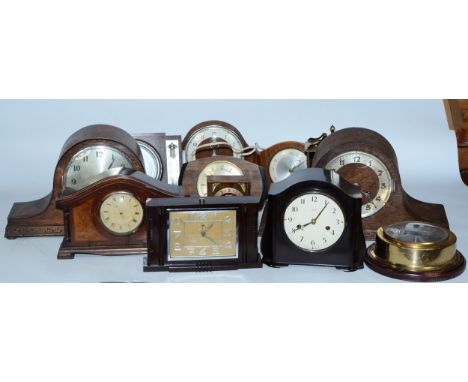A collection of early 20th century and later clocks, to include mantel, carriage, traveling alarm and others, having manual w
