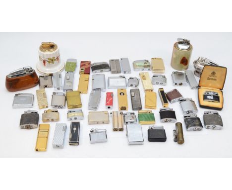 A collection of mid 20th century and later cigarette lighters, pocket and table, gas and petrol filled, makers to include Ron