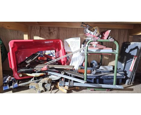 A collection of G Clamps and small furniture clamps and other tools 