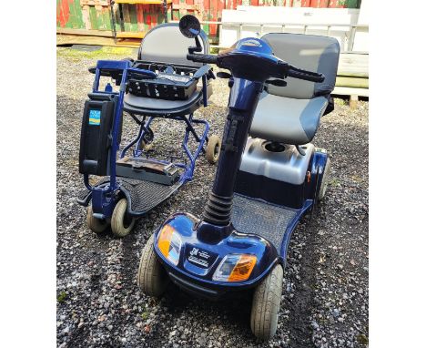 A Strider four wheeled mobility scooter, with An Aqua mobility scooter, having charger and key. 