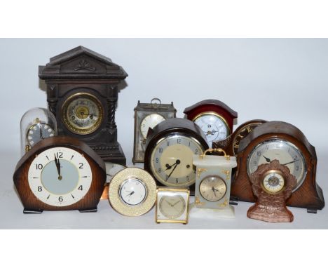 A collection of early 20th century and later clocks, having manual and quartz movements, to include mantel, carriage, traveli