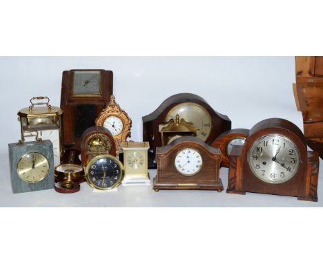A collection of early 20th century and later clocks, to include mantel, carriage, traveling alarm and others, having manual w
