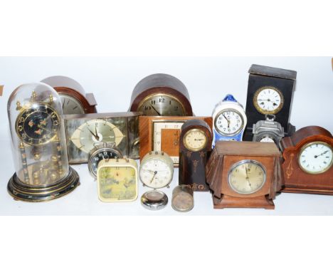 A collection of early 20th century and later clocks, to include mantel, carriage, traveling and wall clocks, having manual wi