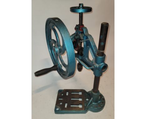A cast iron manual bench pillar drill, 48cm tall. 