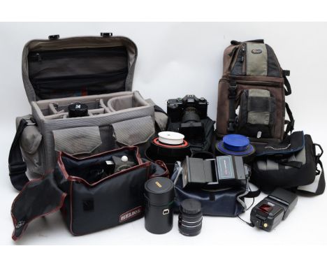 A collection of camera equipment and accessories to include a pair of Courtenay solarflash 4000 studio flash lights, Yashica 